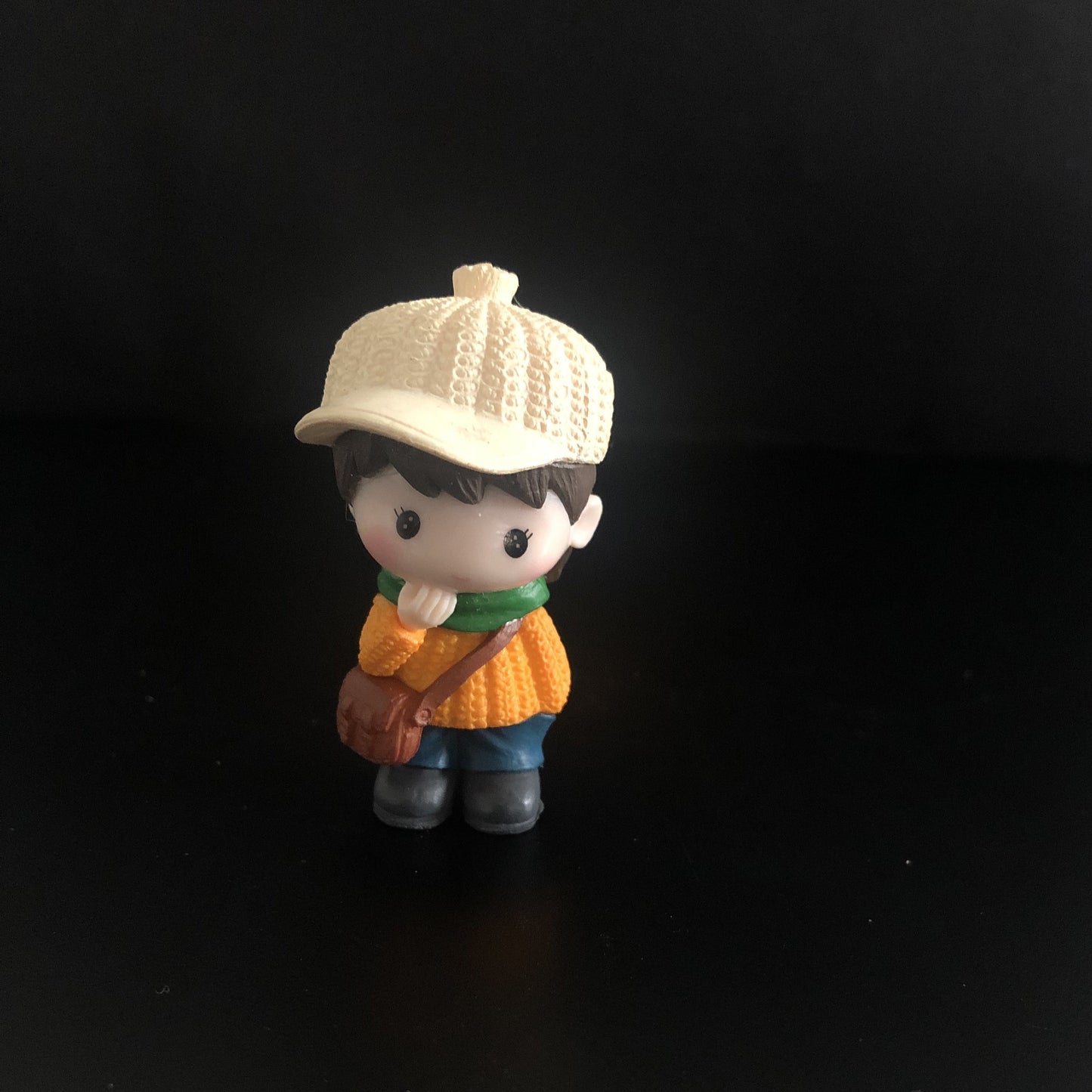 young boy, cap, jacket, sweater, muffler, boots, sling bag