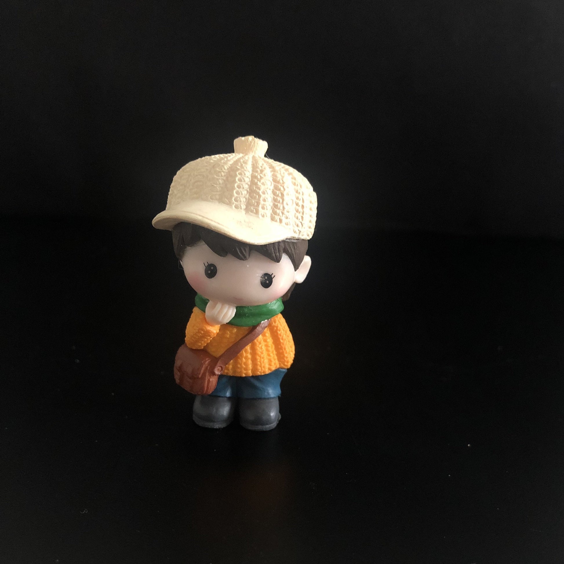 young boy, cap, jacket, sweater, muffler, boots, sling bag