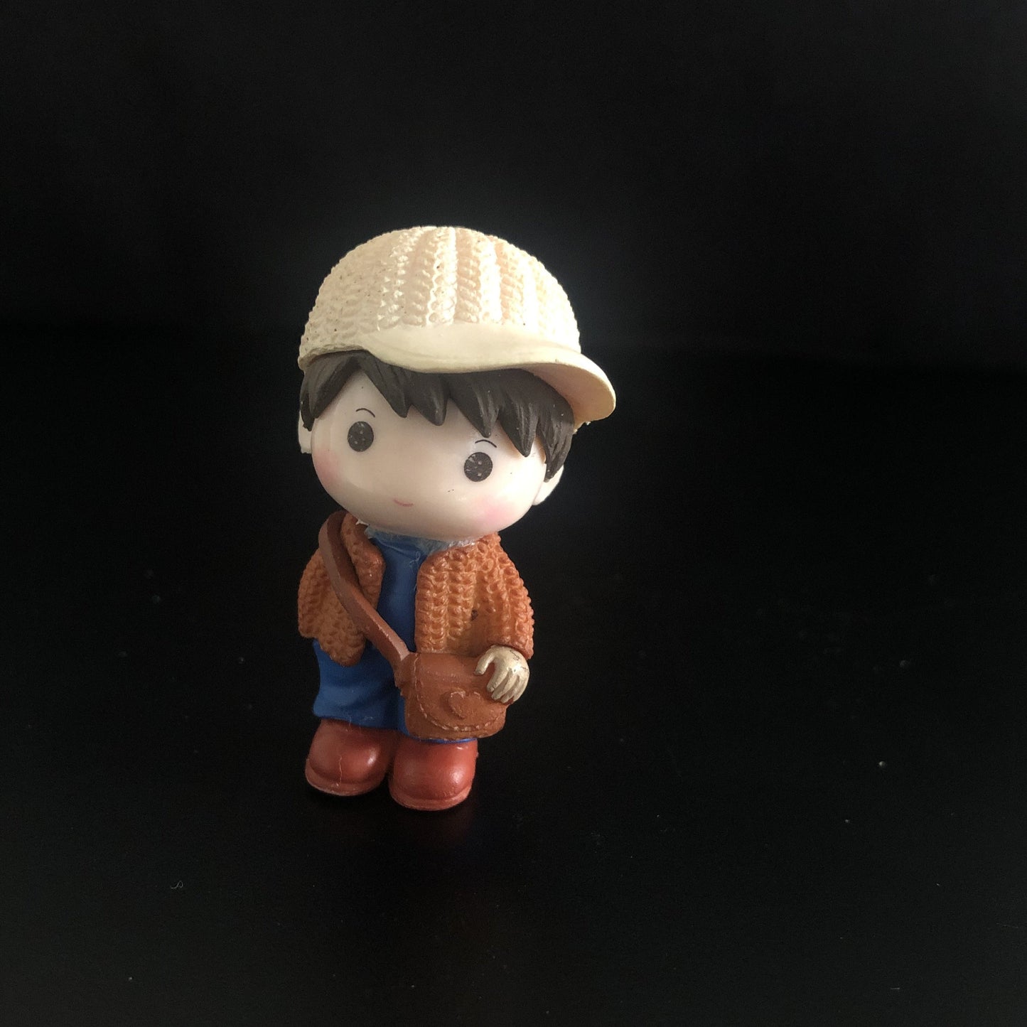 young boy, cap, jacket, sweater, muffler, boots, sling bag