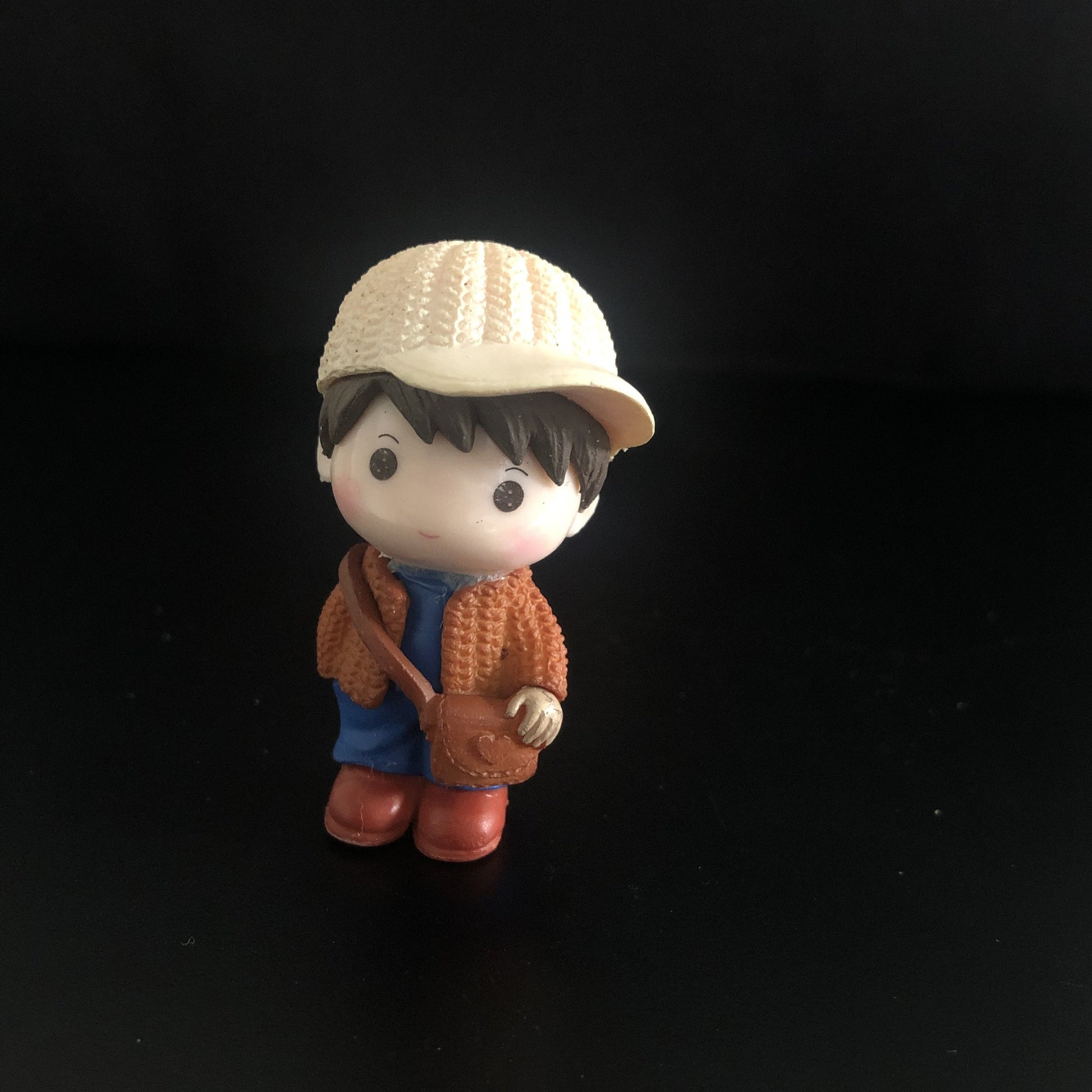 young boy, cap, jacket, sweater, muffler, boots, sling bag