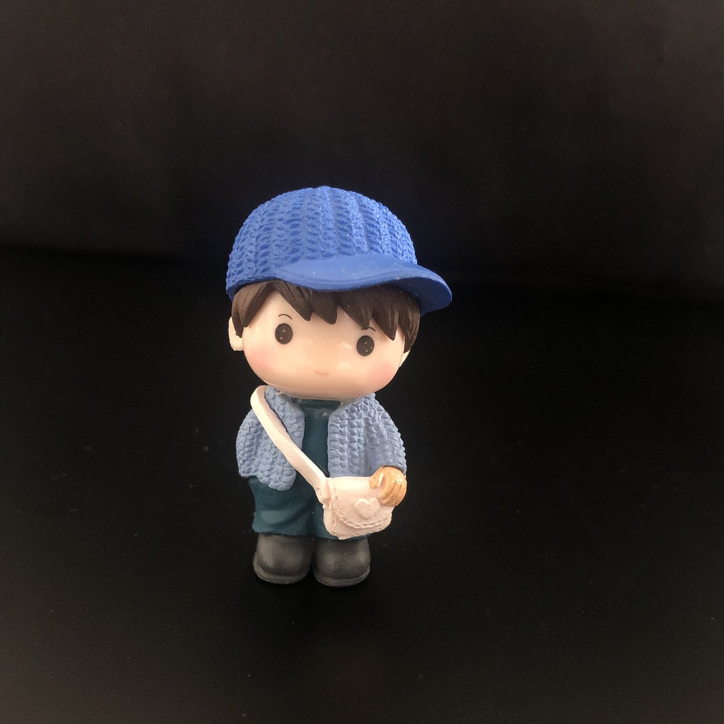young boy, cap, jacket, sweater, muffler, boots, sling bag