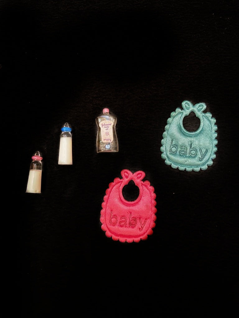 tiny baby oil, milk bottle, baby bibs, baby shower, baby products